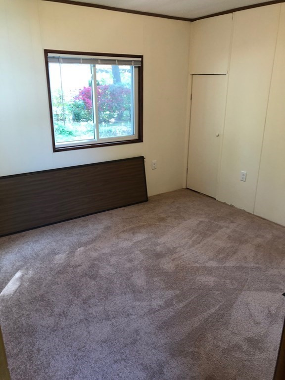 8 Lisa Circle Merrimac, MA 01860 - Photo 13 of 17 an empty room with windows