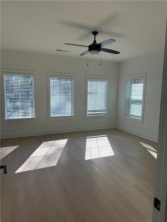 Undisclosed Address Atlanta, GA 30310 - Photo 18 of 25 a view of an empty room with windows