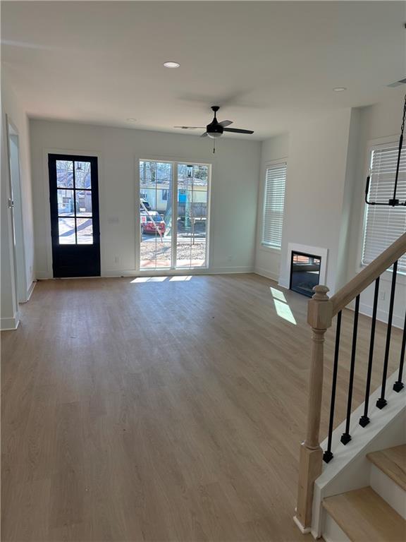 Undisclosed Address Atlanta, GA 30310 - Photo 5 of 25 wooden floor in an empty room with a window