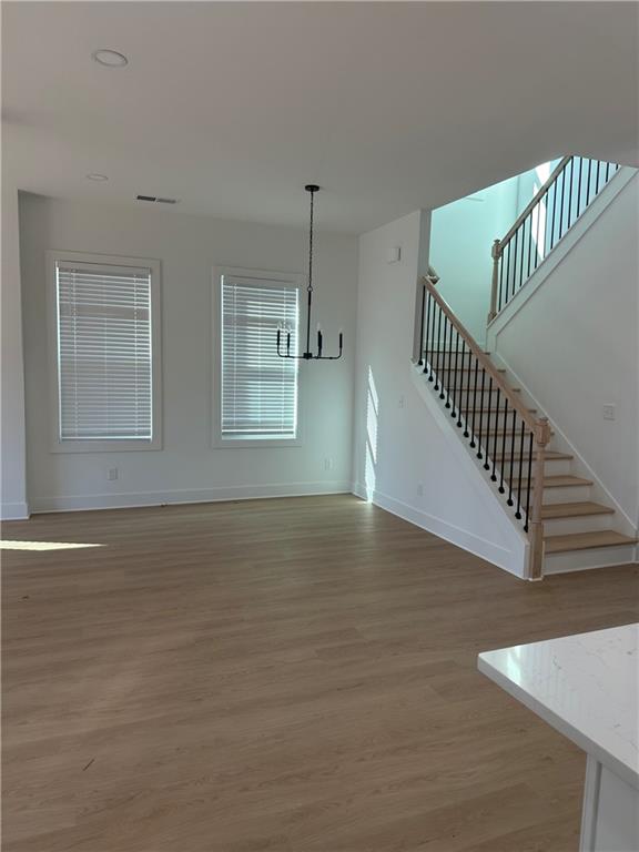 Undisclosed Address Atlanta, GA 30310 - Photo 7 of 25 a view of an entryway with wooden floor