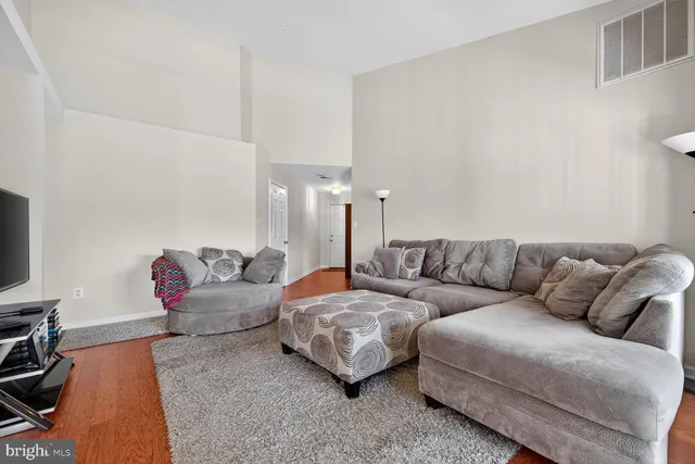 a living room with furniture and a couch