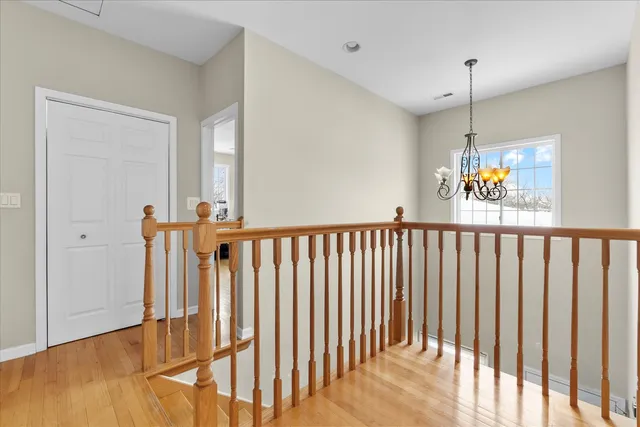a view of an entryway wooden floor