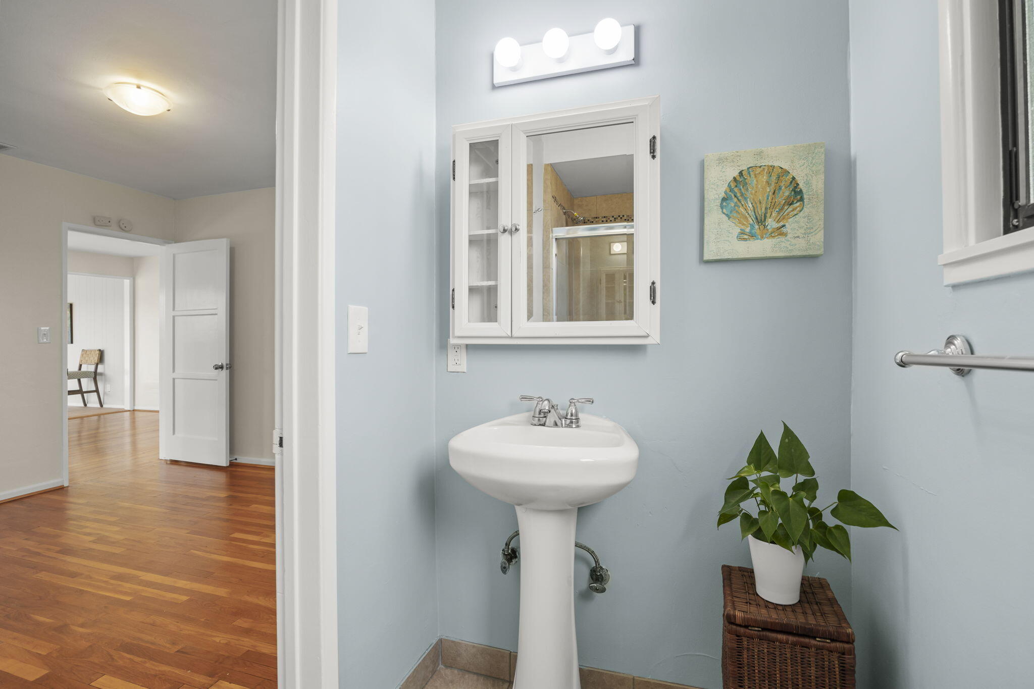 155 South Ontare Road Santa Barbara, CA 93105 - Photo 23 of 45 a bathroom with a sink a mirror and a window