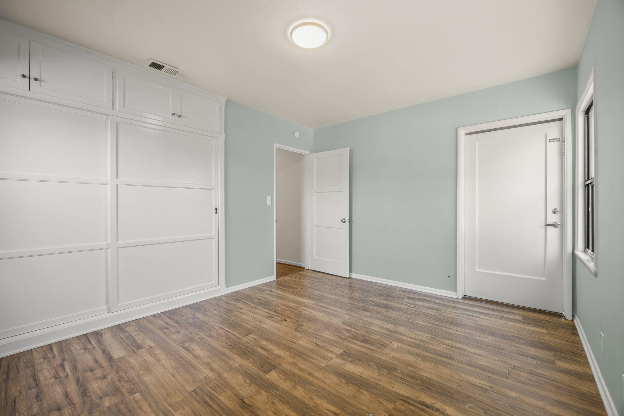 155 South Ontare Road Santa Barbara, CA 93105 - Photo 31 of 45 a view of an empty room with wooden floor