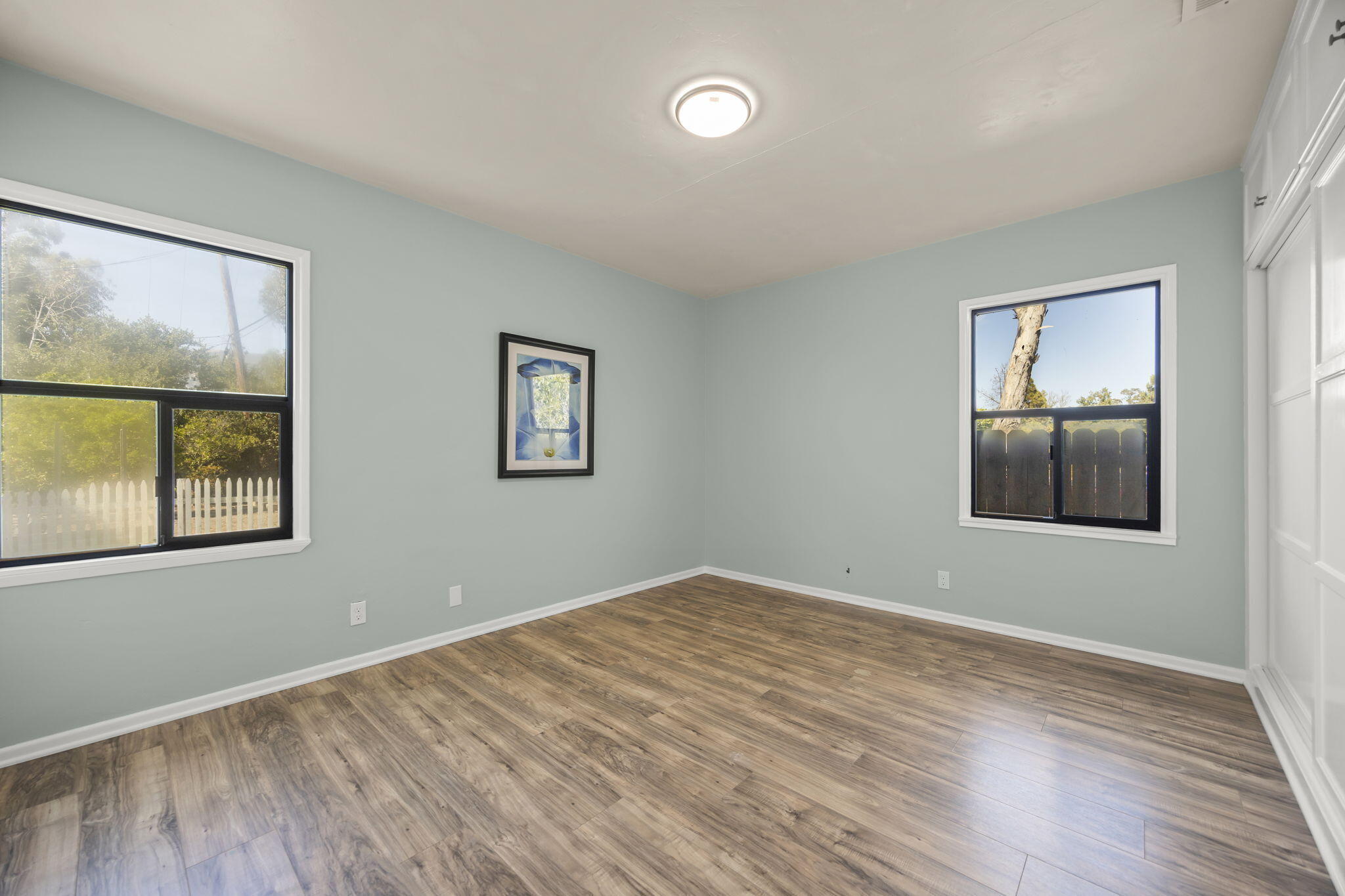 155 South Ontare Road Santa Barbara, CA 93105 - Photo 32 of 45 a view of empty room with wooden floor and fan
