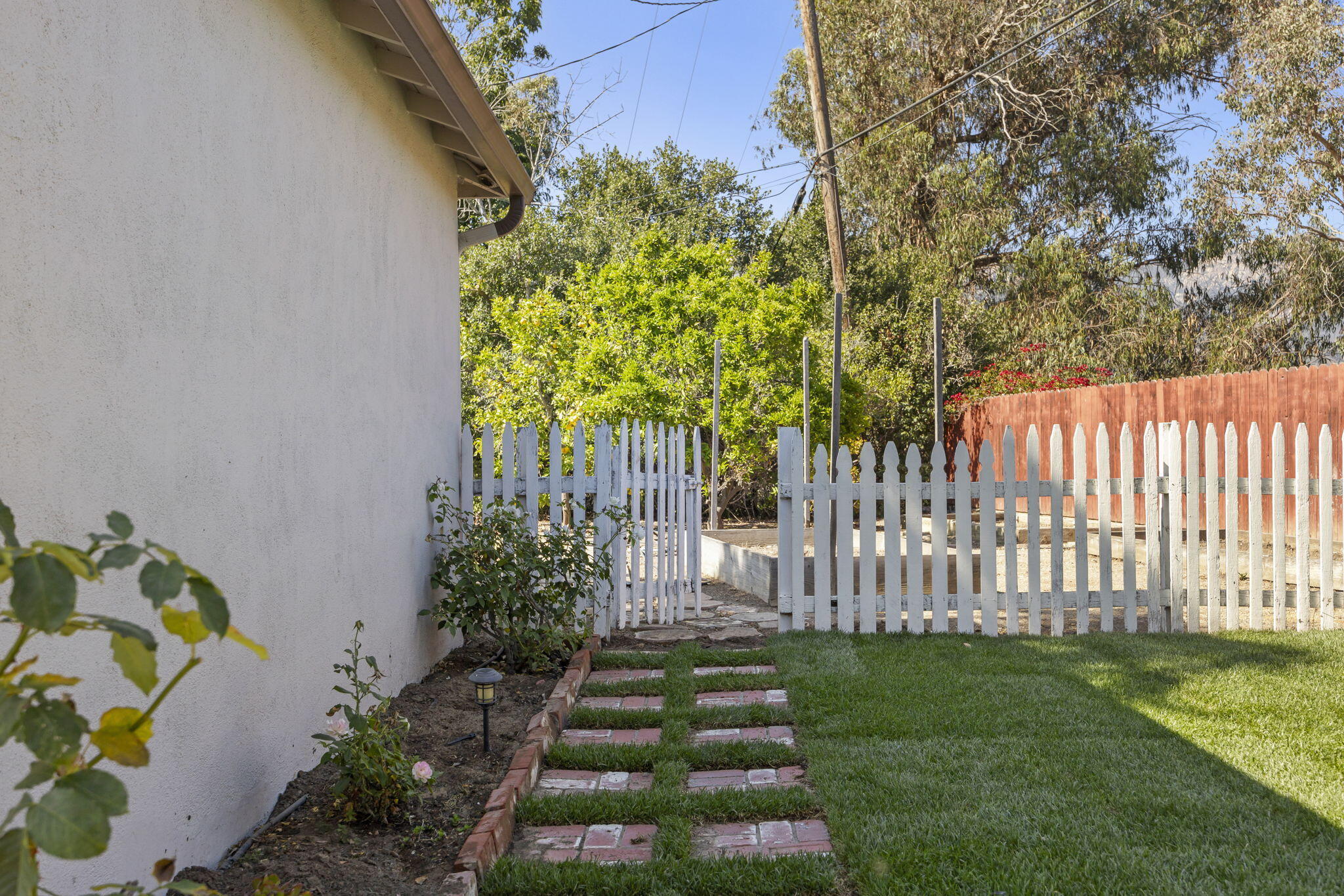 155 South Ontare Road Santa Barbara, CA 93105 - Photo 36 of 45 a view of a house with a yard