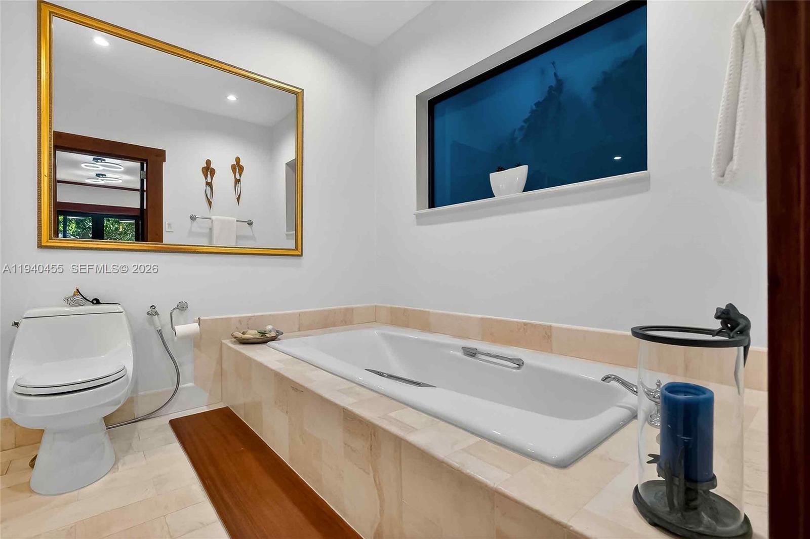 452 Southwest 21st Road Miami, FL 33129 - Photo 19 of 51 a bathroom with a sink and a toilet