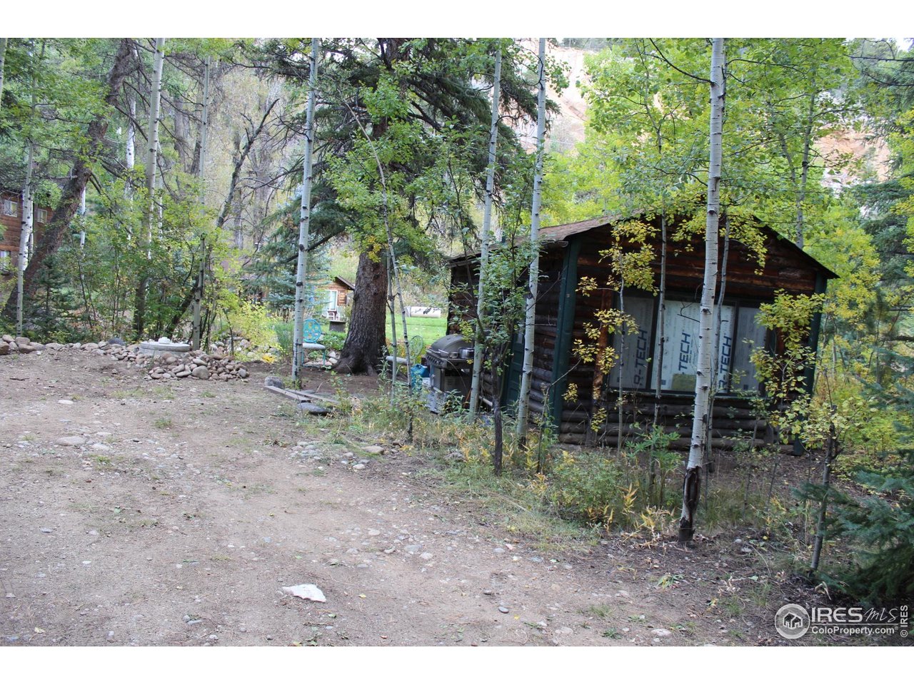 223 Riverside Drive Lyons, CO 80540 - Photo 13 of 33 Workshop/studio with porch on river