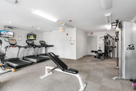 a view of a room with gym equipment