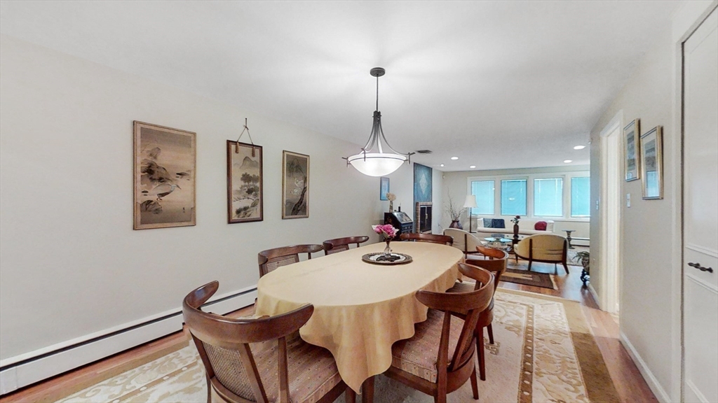 30 Tyler Road Lexington, MA 02420 - Photo 20 of 40 a view of a dining room with furniture and wooden floor