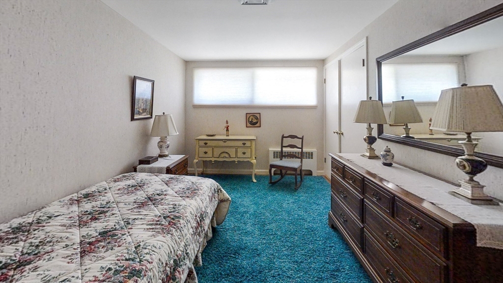 30 Tyler Road Lexington, MA 02420 - Photo 23 of 40 a bedroom with a bed and a window