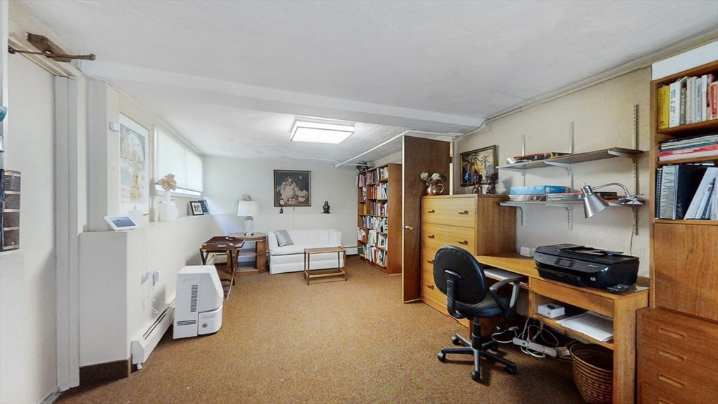 30 Tyler Road Lexington, MA 02420 - Photo 27 of 40 a view of a livingroom with workspace and a window