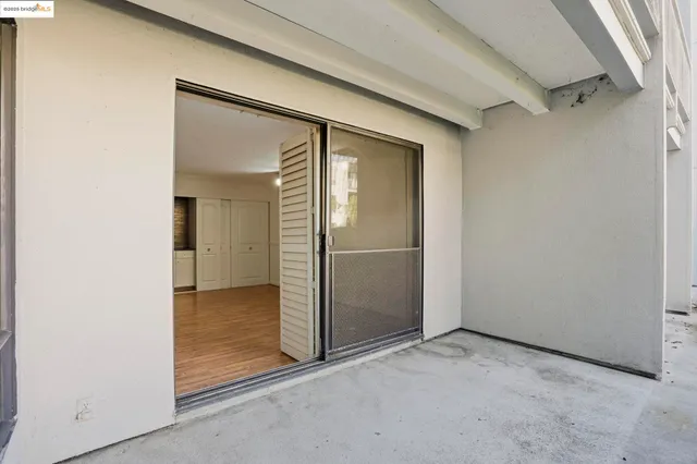 an empty room with mirror