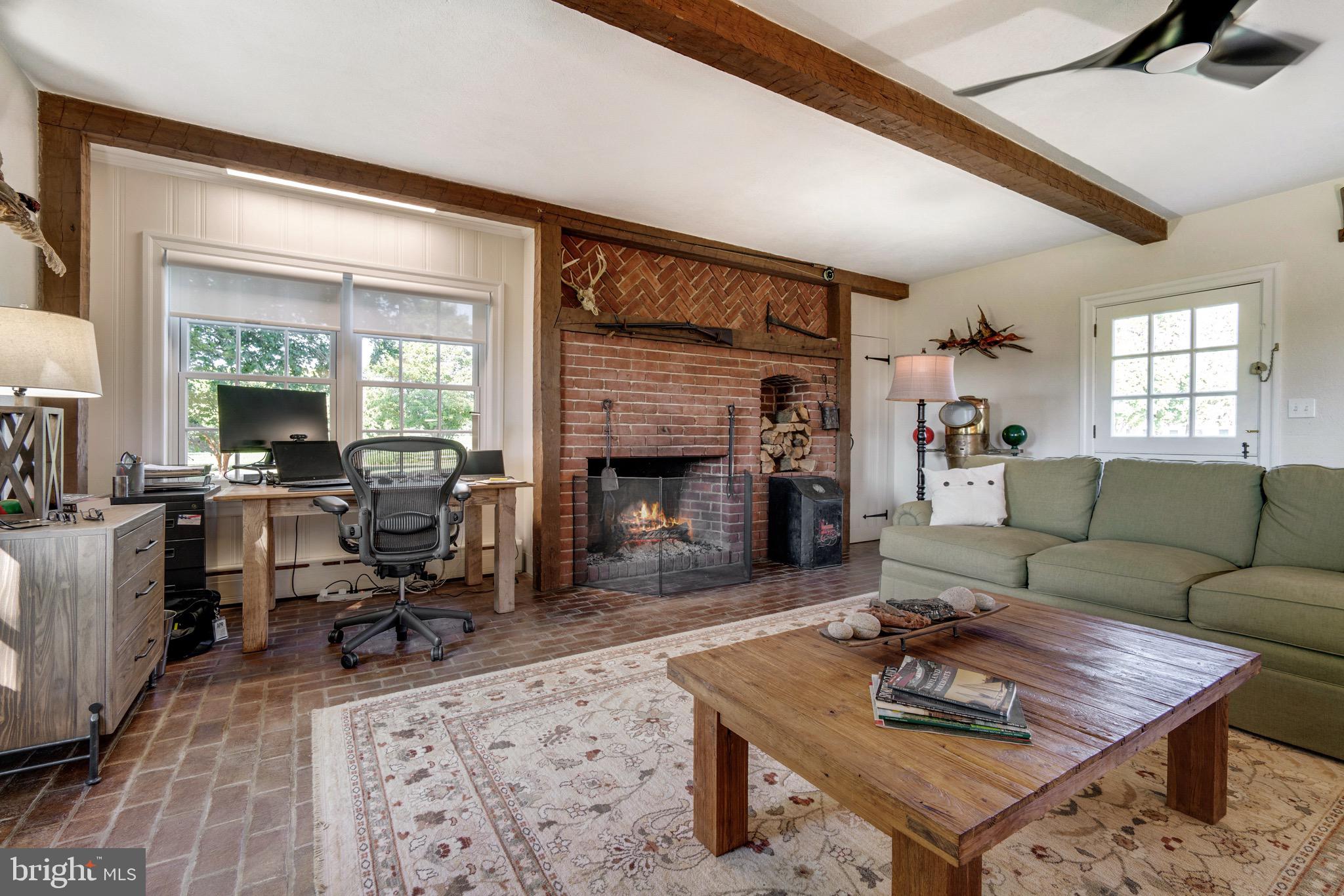 6029 Edesville Road Rock Hall, MD 21661 - Photo 28 of 75 Den features wood burning fireplace