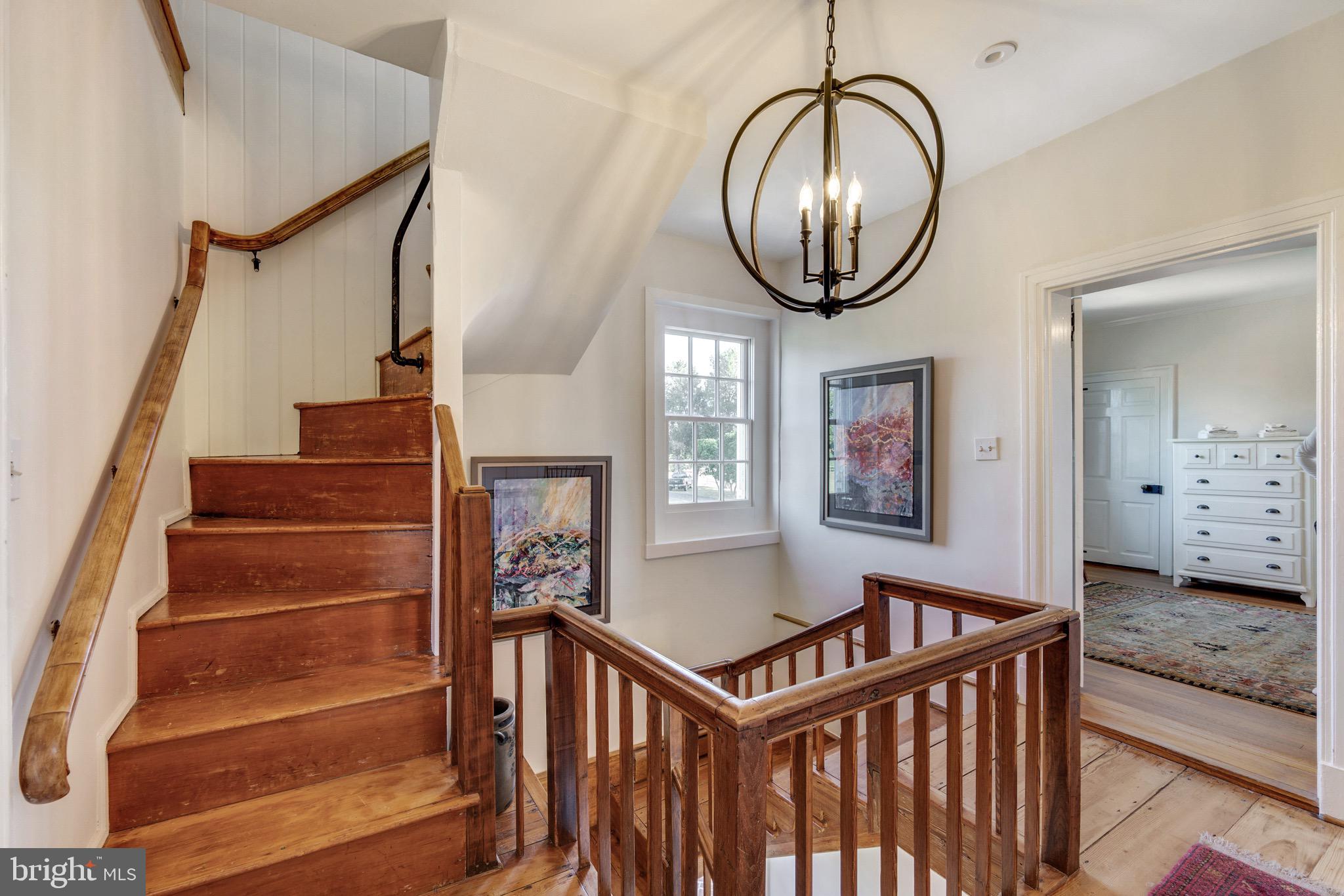 6029 Edesville Road Rock Hall, MD 21661 - Photo 33 of 75 2nd floor landing, new fixtures, original railing