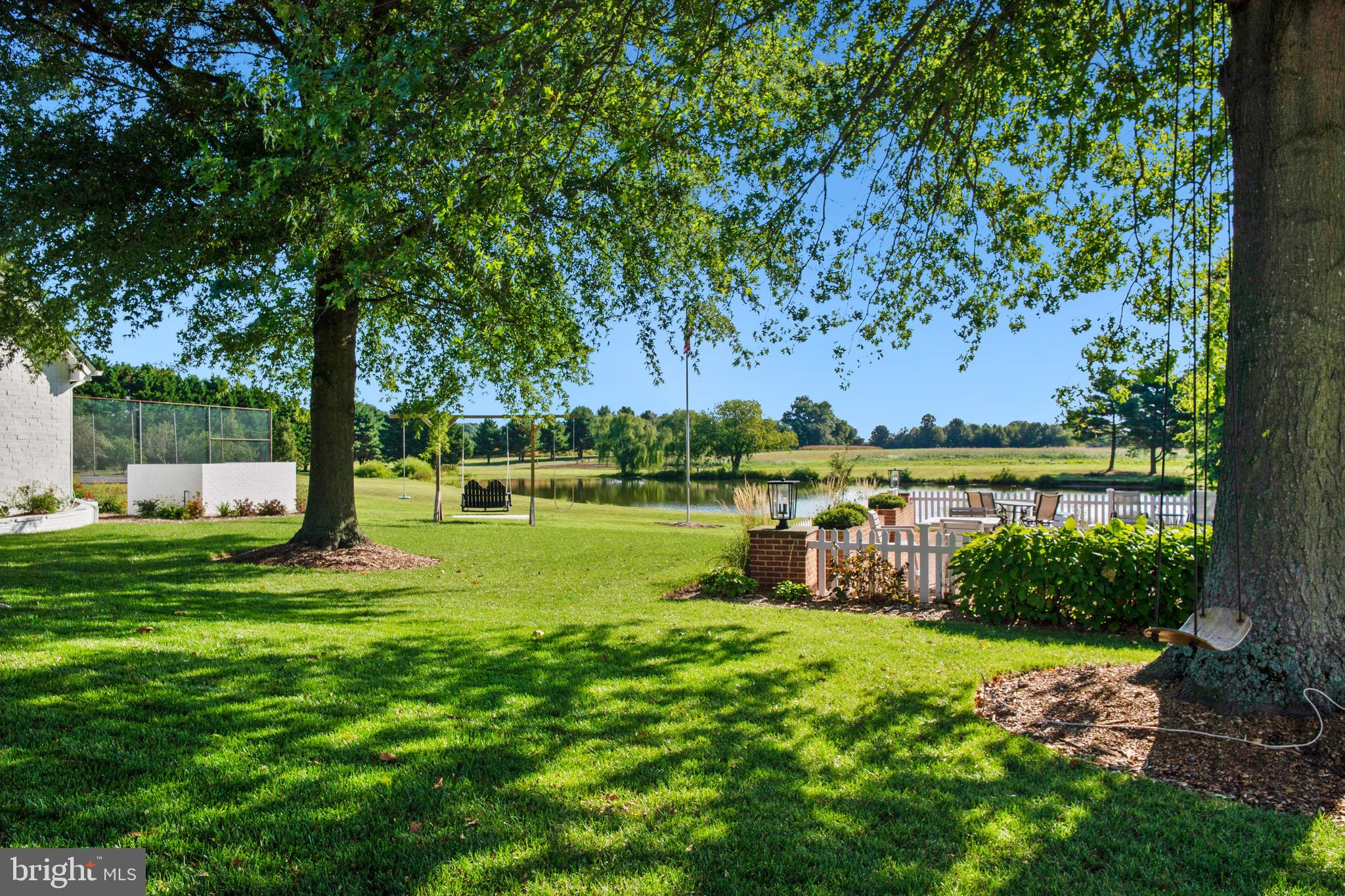 6029 Edesville Road Rock Hall, MD 21661 - Photo 54 of 75 View towards pond adjacent to pool, tennis court