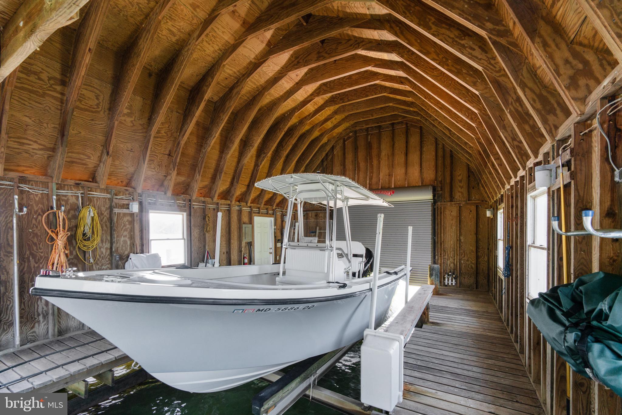 6029 Edesville Road Rock Hall, MD 21661 - Photo 62 of 75 Inside the boat house, 10K boat lift