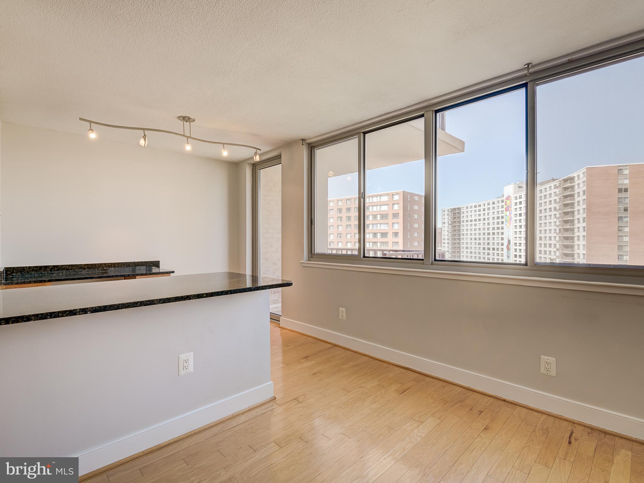 1220 Blair Mill Road, Unit 902 Silver Spring, MD 20910 - Photo 11 of 48 a view of an empty room with a window