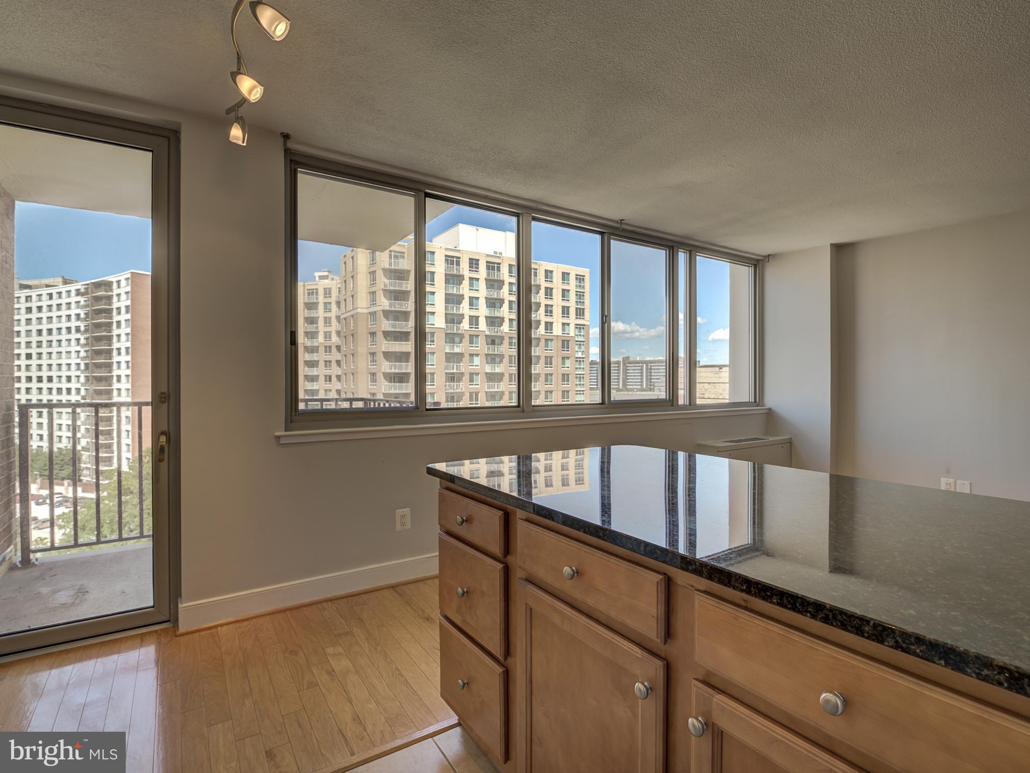 1220 Blair Mill Road, Unit 902 Silver Spring, MD 20910 - Photo 18 of 48 an empty room with windows