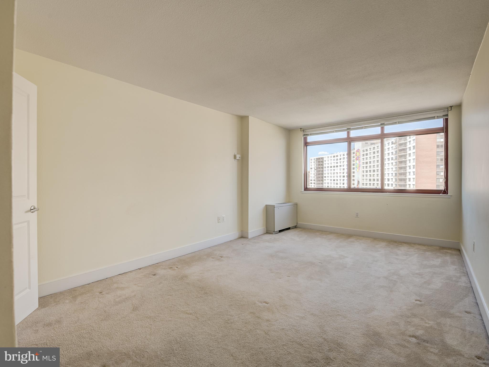 1220 Blair Mill Road, Unit 902 Silver Spring, MD 20910 - Photo 27 of 48 an empty room with windows