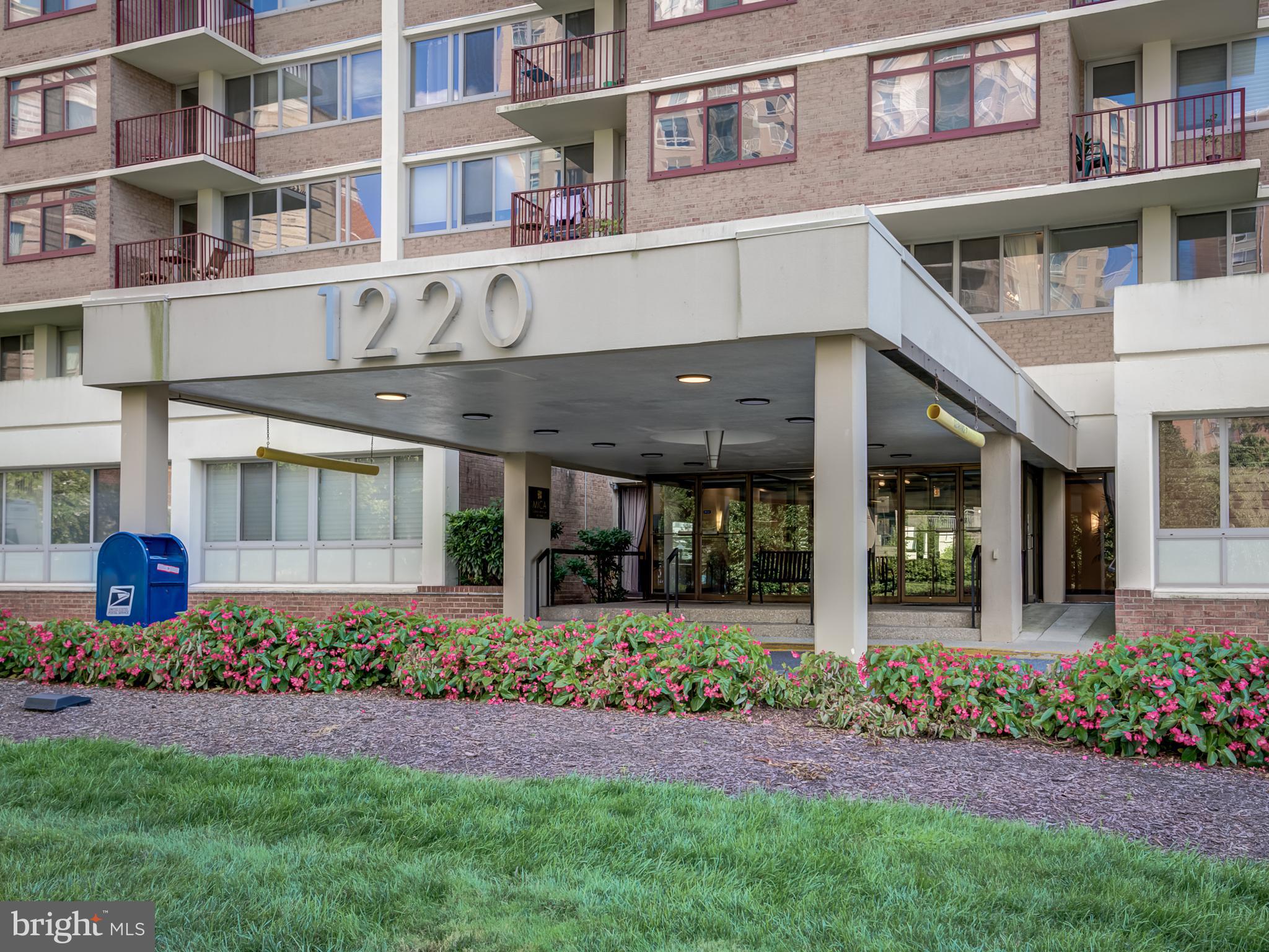 1220 Blair Mill Road, Unit 902 Silver Spring, MD 20910 - Photo 3 of 48 a front view of a building with a garden
