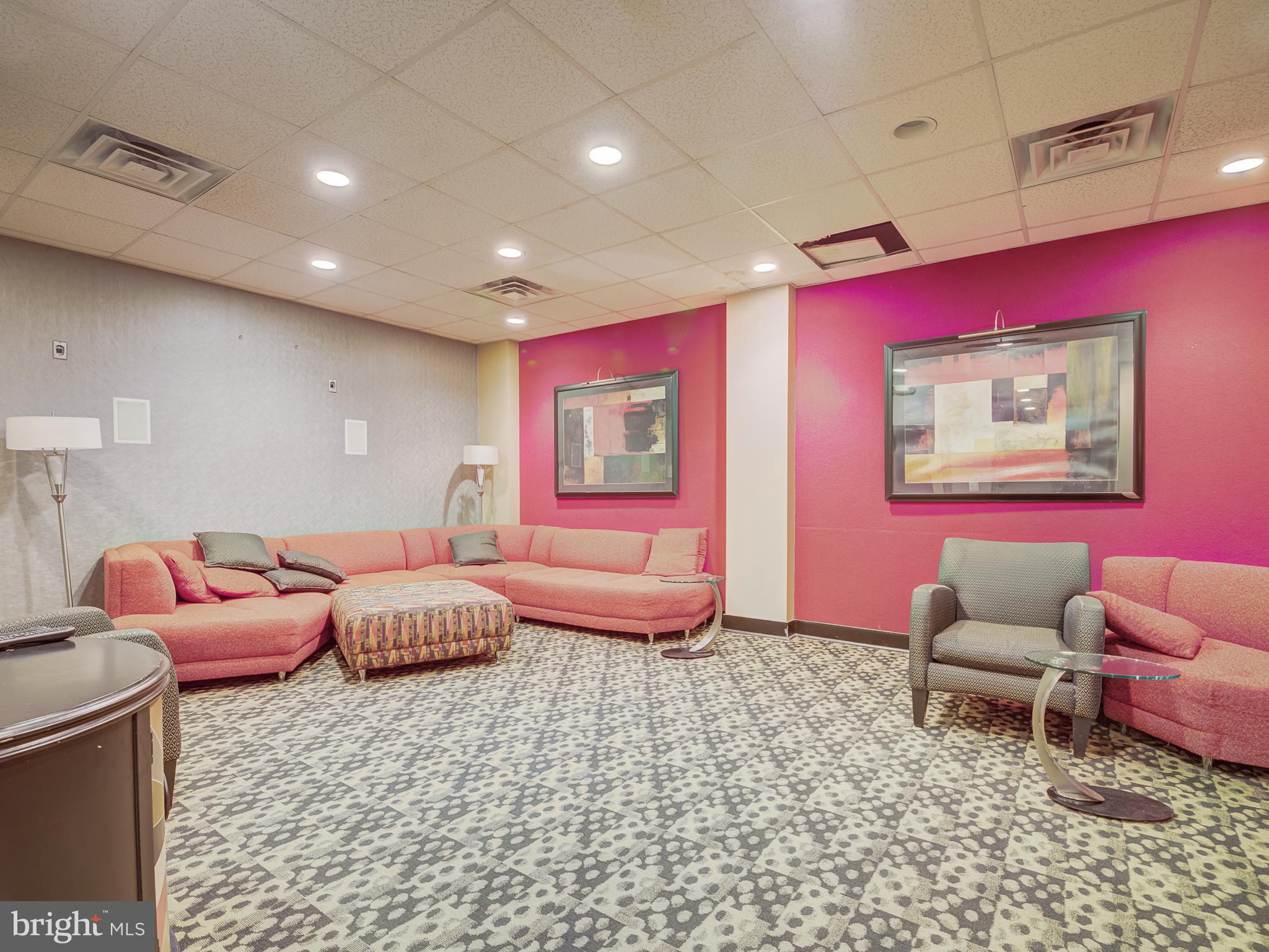 1220 Blair Mill Road, Unit 902 Silver Spring, MD 20910 - Photo 41 of 48 a bedroom with furniture and a couch