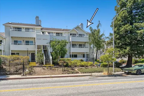 a front view of a building with street view