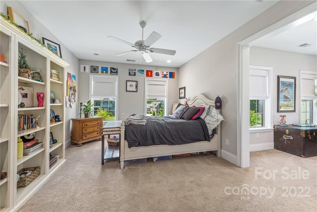 4040 Flowering Peach Road Marvin, NC 28173 - Photo 17 of 38 a bedroom with a bed furniture and a large window
