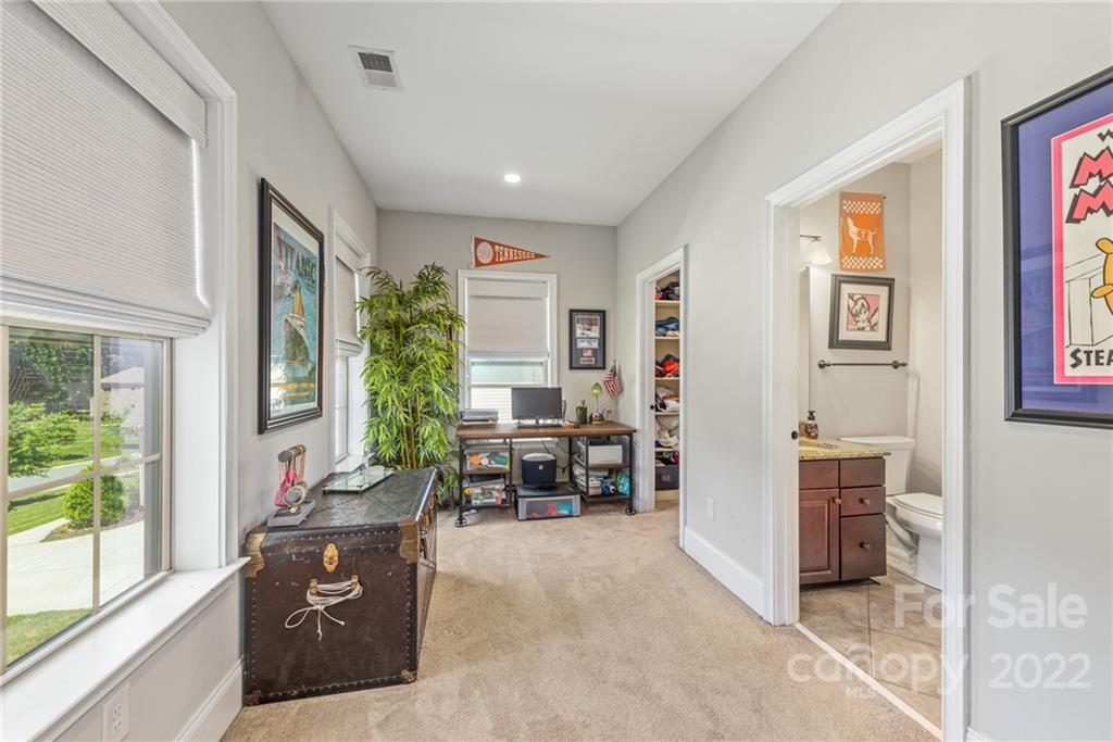 4040 Flowering Peach Road Marvin, NC 28173 - Photo 18 of 38 a living room with furniture and a window