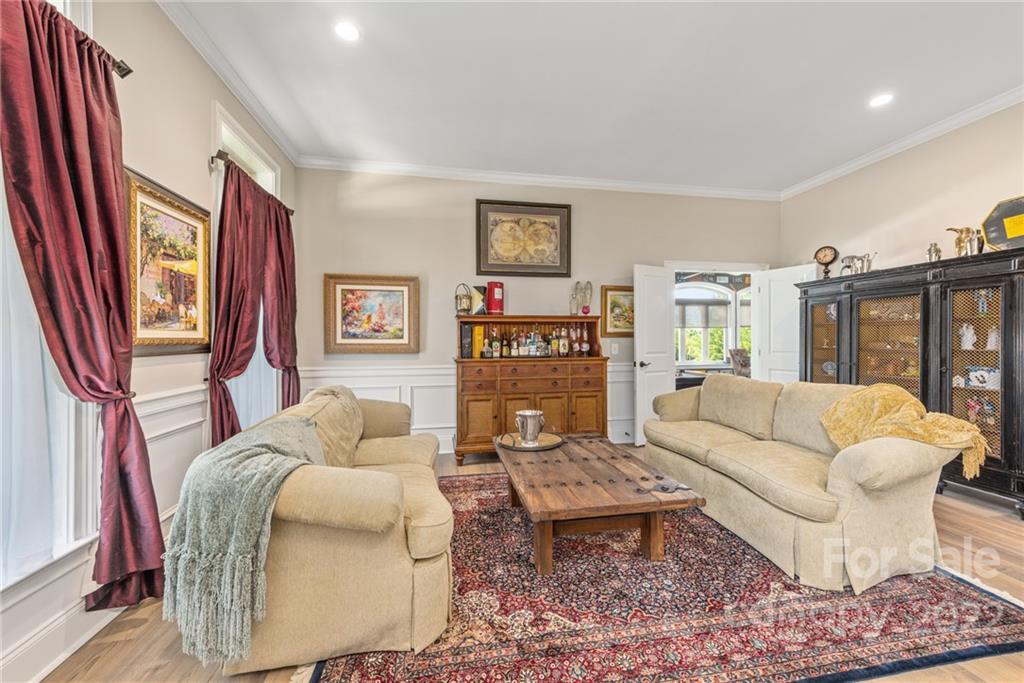 4040 Flowering Peach Road Marvin, NC 28173 - Photo 25 of 38 a living room with furniture and large window with rug