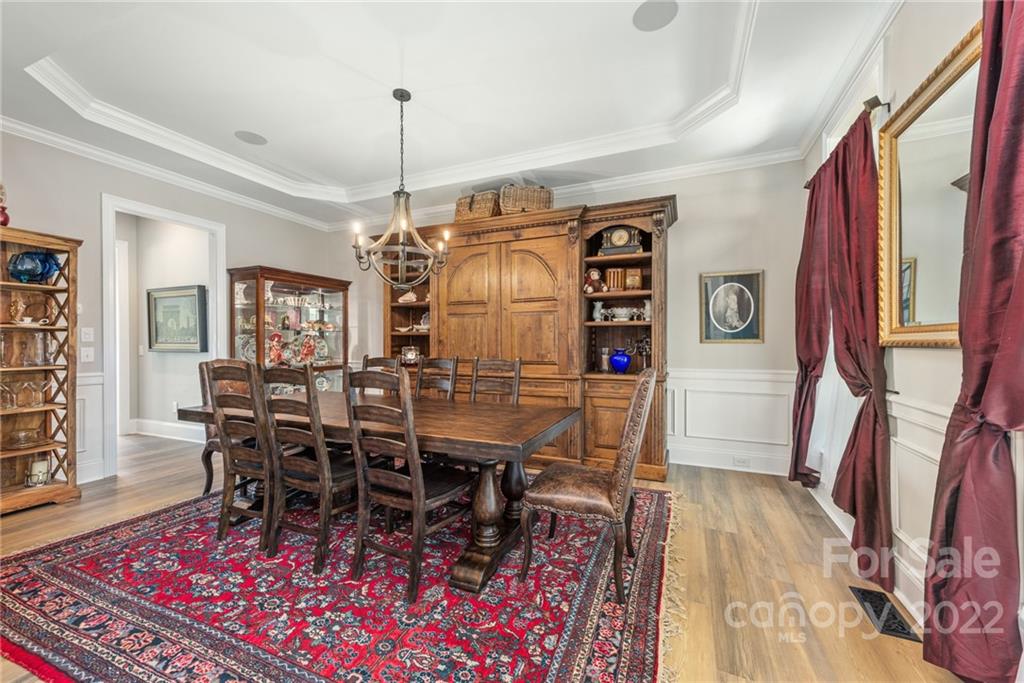 4040 Flowering Peach Road Marvin, NC 28173 - Photo 26 of 38 a view of a dining room with furniture window and wooden floor