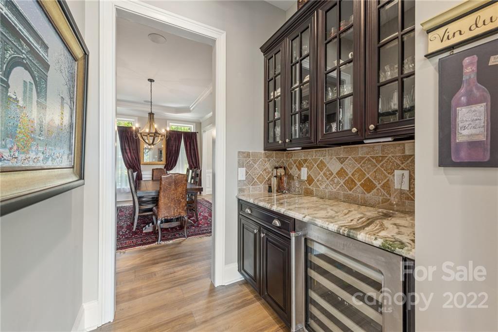 4040 Flowering Peach Road Marvin, NC 28173 - Photo 27 of 38 a view of a kitchen cabinets and wooden floor