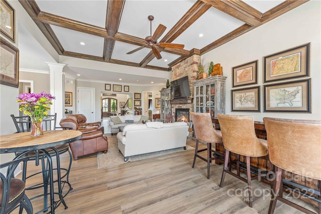 4040 Flowering Peach Road Marvin, NC 28173 - Photo 33 of 38 a view of a dining room with furniture window and wooden floor