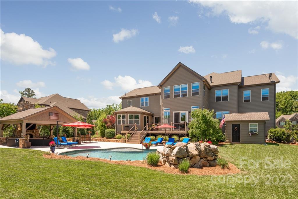 4040 Flowering Peach Road Marvin, NC 28173 - Photo 6 of 38 a front view of house with yard and outdoor seating