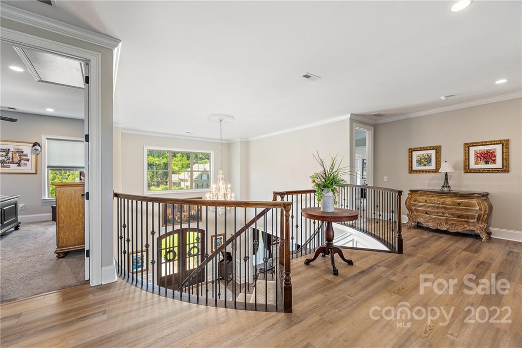 4040 Flowering Peach Road Marvin, NC 28173 - Photo 10 of 38 a view of a livingroom with furniture and hardwood floor