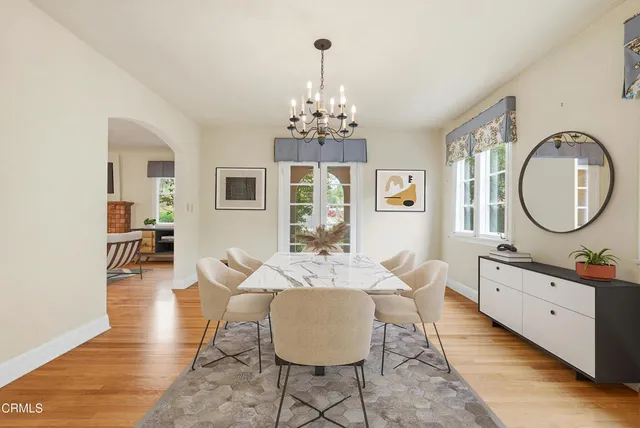a kitchen with granite countertop a sink and a stove
