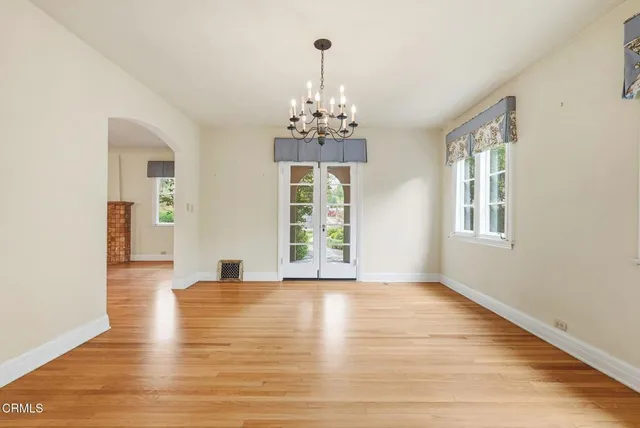 a kitchen with granite countertop stainless steel appliances a stove and refrigerator