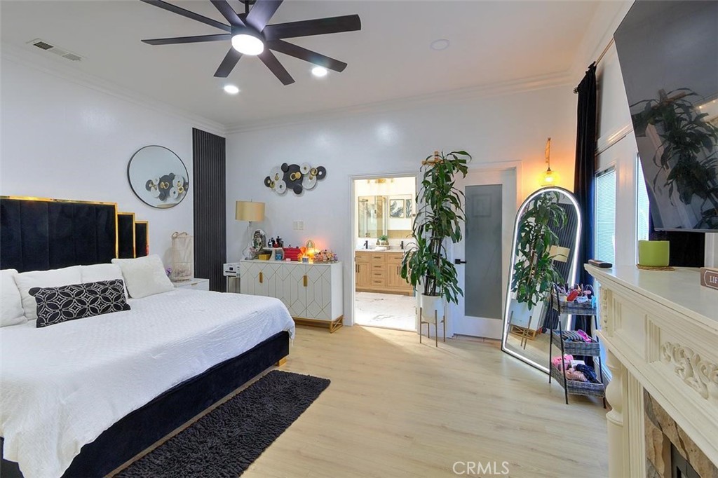 11523 Richeon Avenue Downey, CA 90241 - Photo 15 of 25 a bedroom with a bed dresser and a window