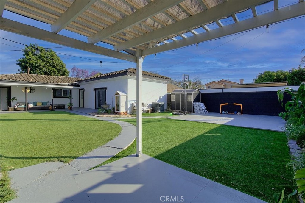 11523 Richeon Avenue Downey, CA 90241 - Photo 21 of 25 a view of a house with a patio