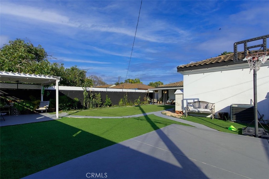 11523 Richeon Avenue Downey, CA 90241 - Photo 24 of 25 a view of a house with a yard