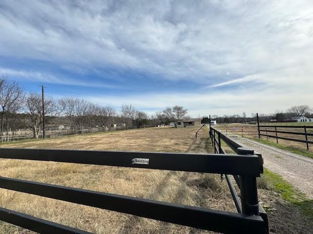 3130 Jordan Valley Road Dallas, TX 75253 - Photo 1 of 1 View of yard featuring a rural view and fence
