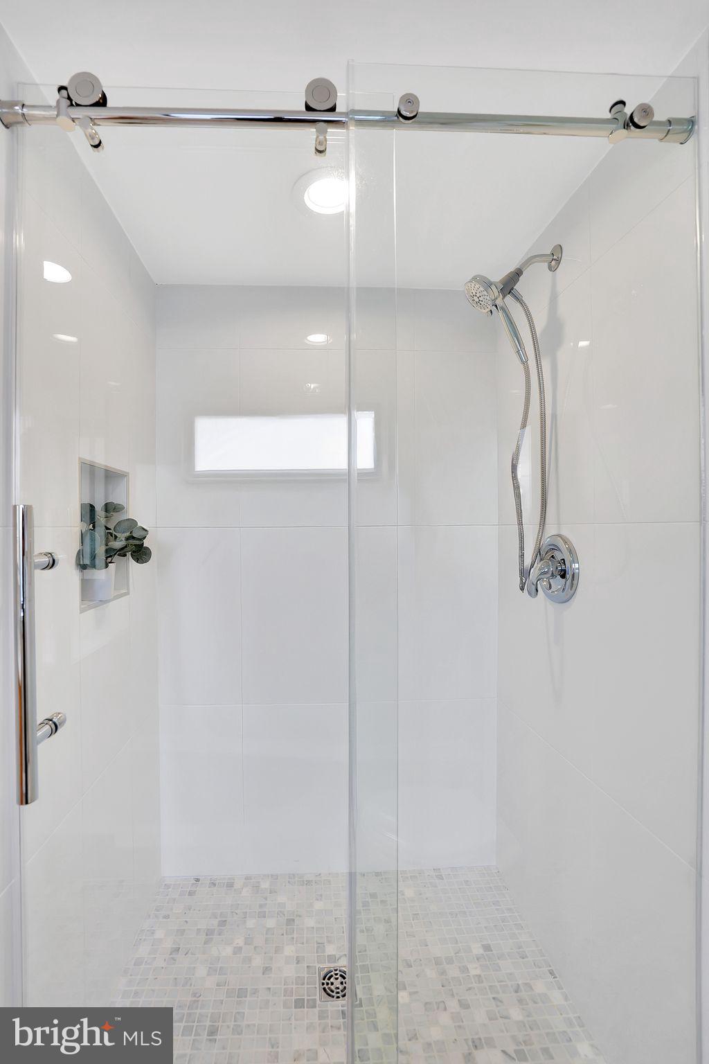 650 Wharf Street Southwest, Unit Z01 Washington, DC 20024 - Photo 11 of 35 a bathroom with a shower