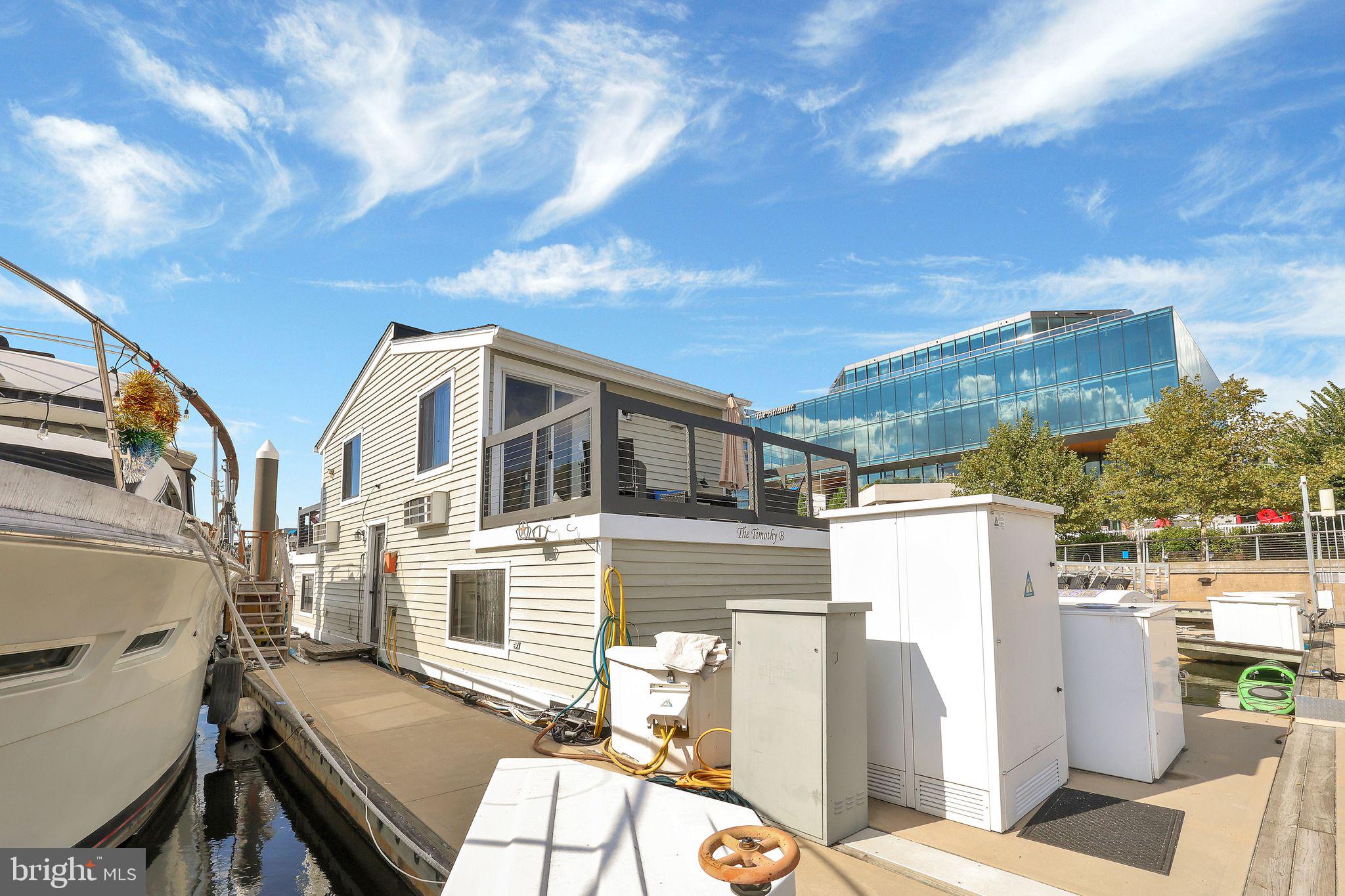 650 Wharf Street Southwest, Unit Z01 Washington, DC 20024 - Photo 15 of 35 a view of a patio with a table and chairs