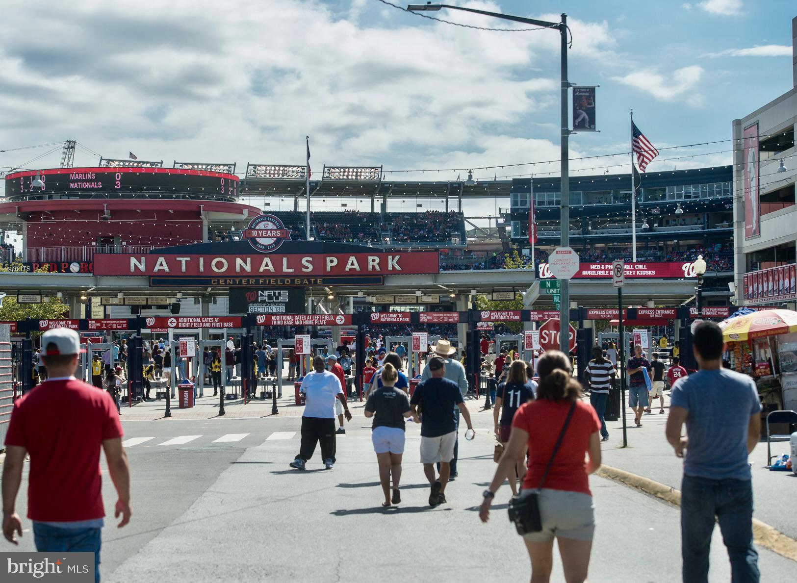 650 Wharf Street Southwest, Unit Z01 Washington, DC 20024 - Photo 32 of 35 a group of people sitting outside a restaurant