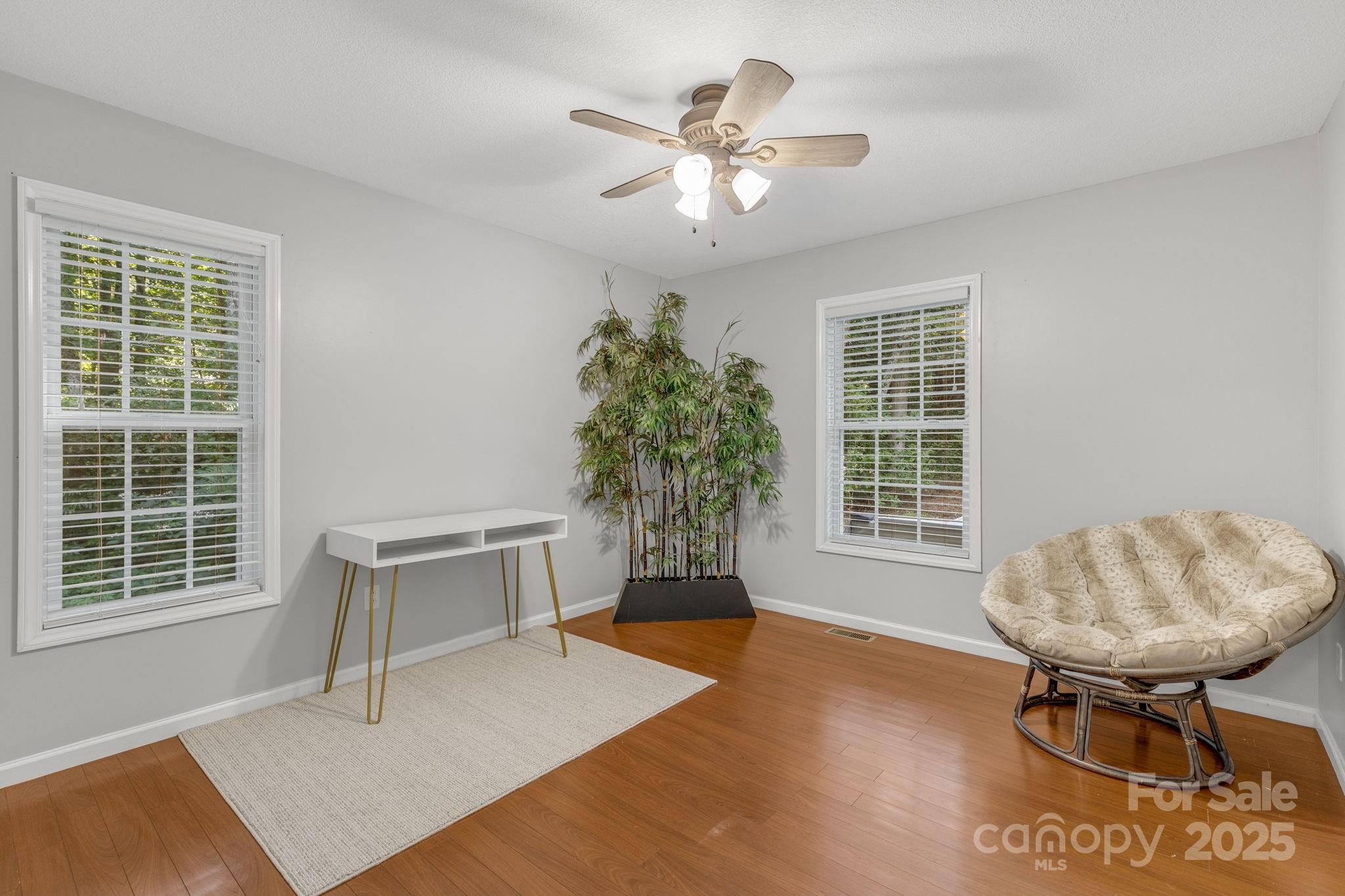 904 Mills Gap Road Fletcher, NC 28732 - Photo 18 of 36 a workspace with furniture and a window
