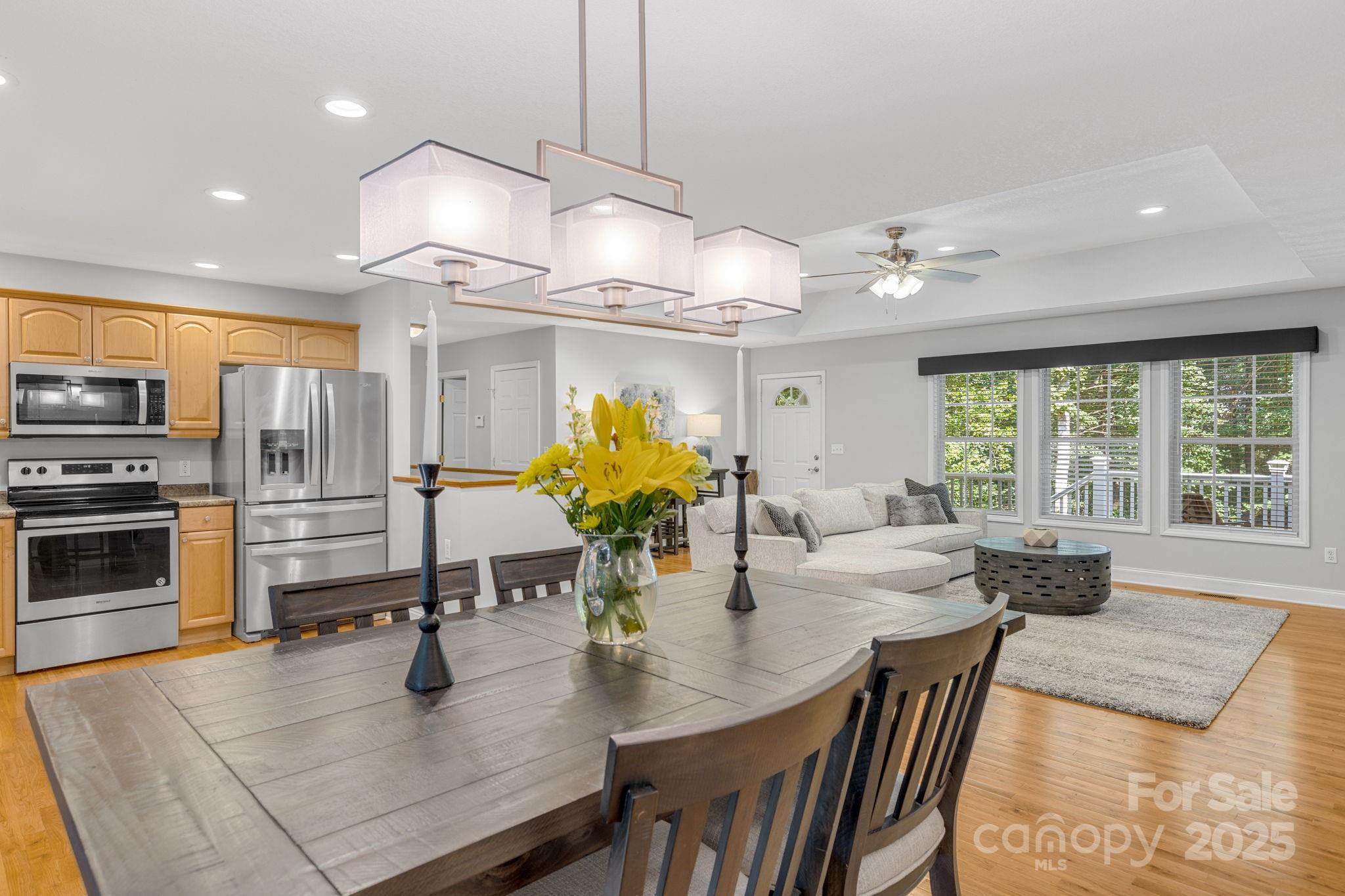 904 Mills Gap Road Fletcher, NC 28732 - Photo 2 of 36 a kitchen with stainless steel appliances granite countertop a stove refrigerator and cabinets