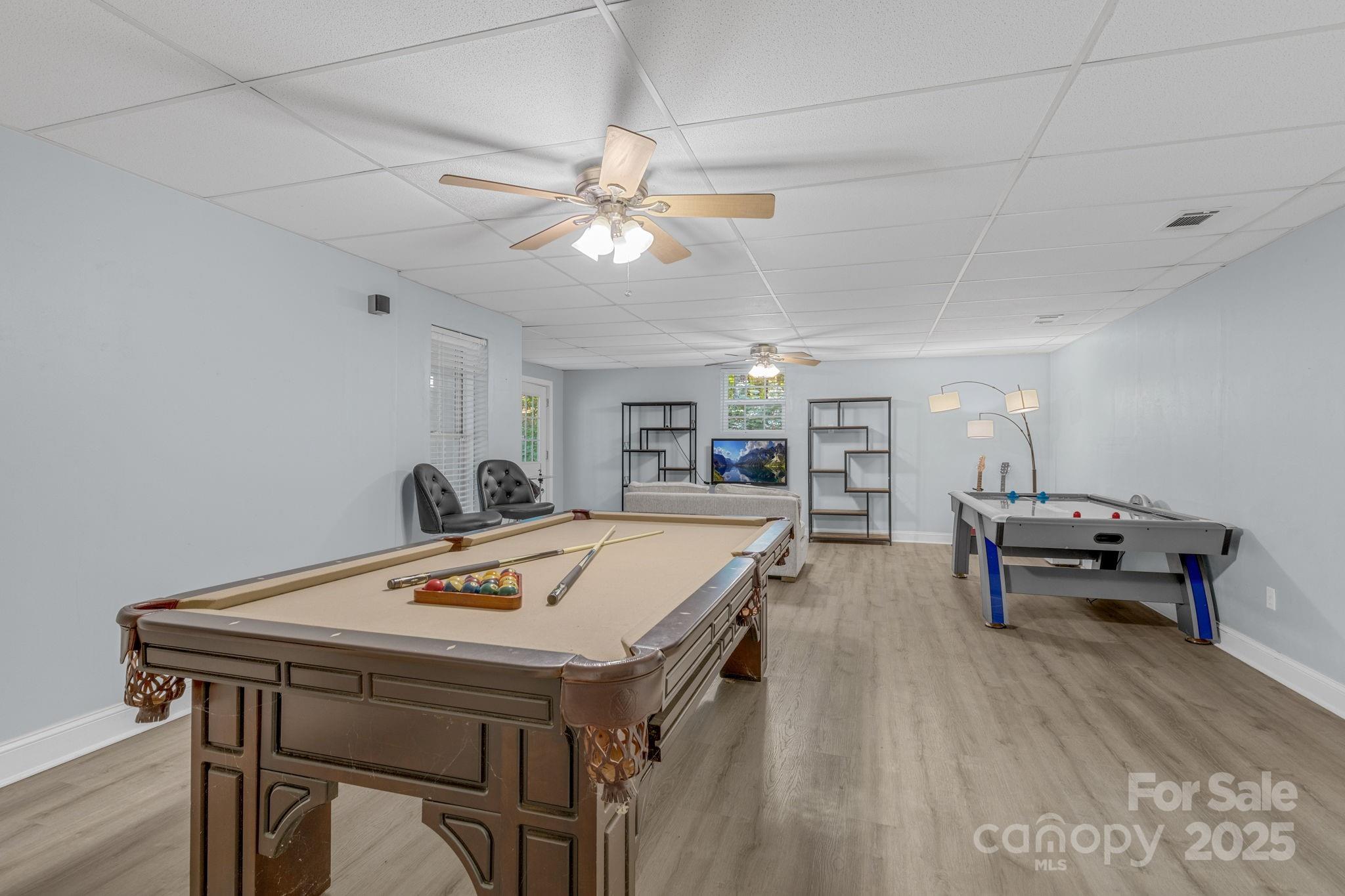 904 Mills Gap Road Fletcher, NC 28732 - Photo 23 of 36 a view of a dining room with furniture and wooden floor