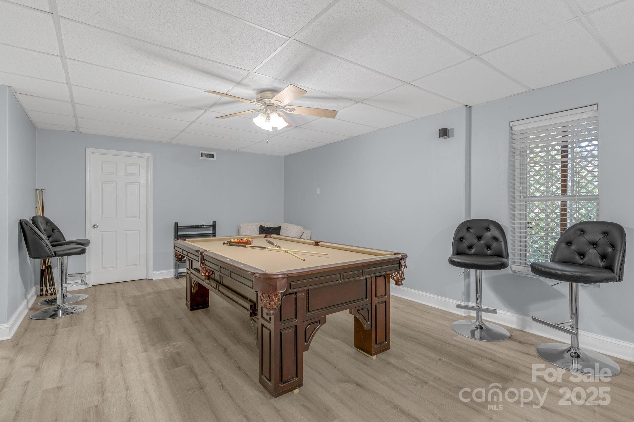 904 Mills Gap Road Fletcher, NC 28732 - Photo 24 of 36 a view of a room with gym equipment