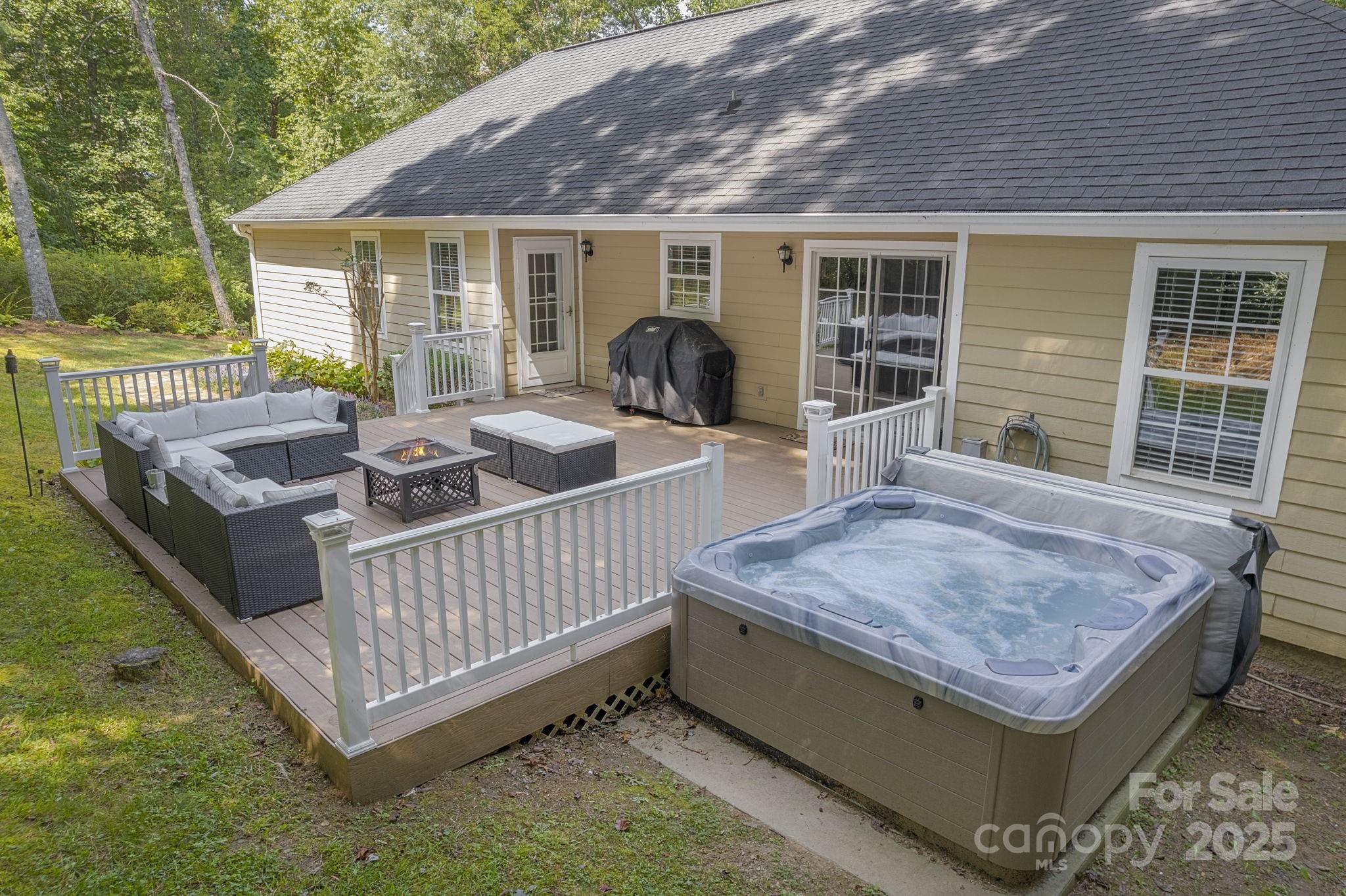 904 Mills Gap Road Fletcher, NC 28732 - Photo 28 of 36 a view of backyard with deck and seating space