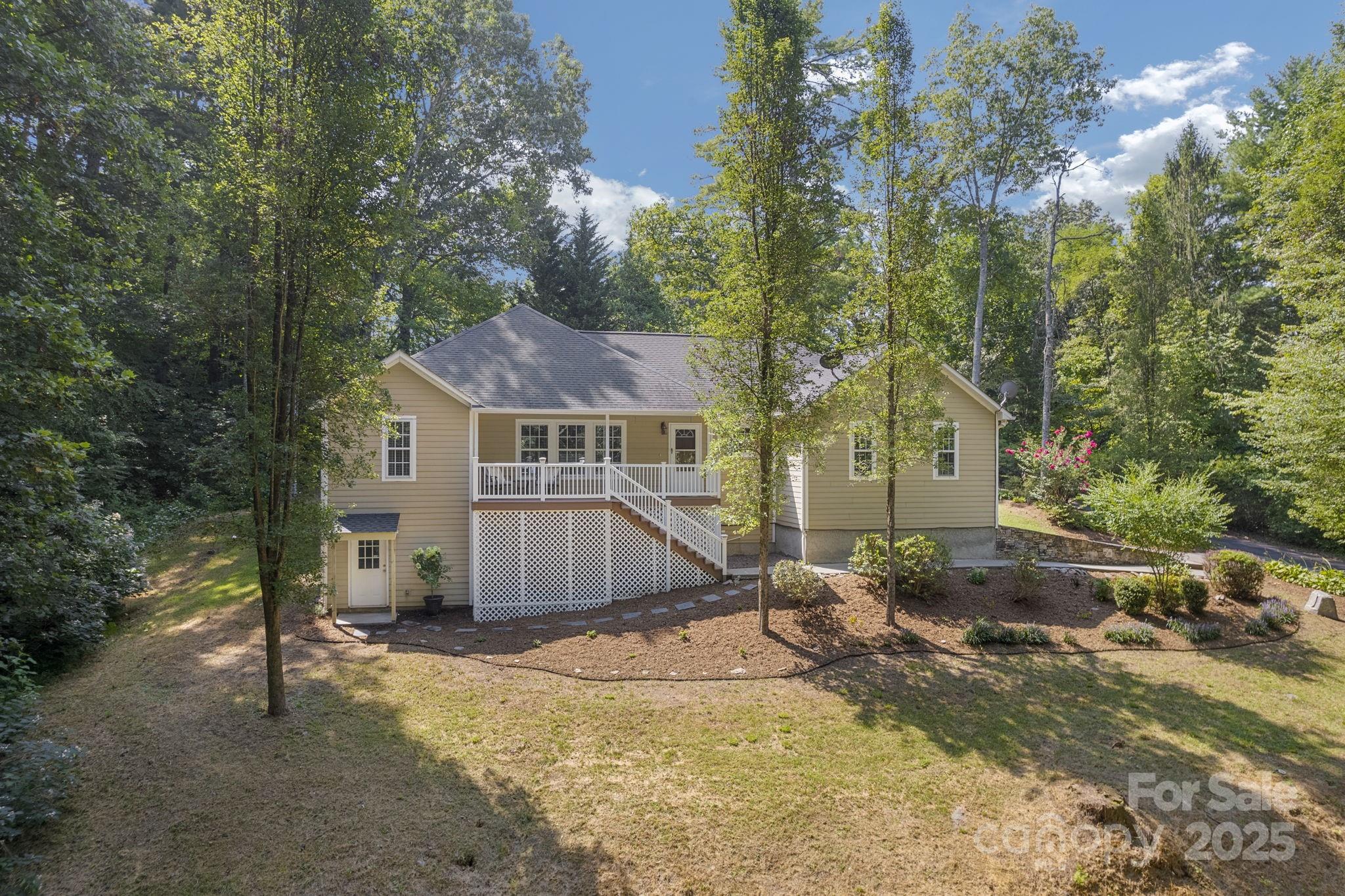 904 Mills Gap Road Fletcher, NC 28732 - Photo 33 of 36 a view of a house with a yard